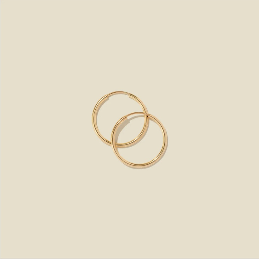 Made by Mary Gold-filled live-in infinity hoop earrings 16mm. NWOT